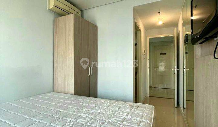 Apartemen Madison, Central Park, Studio, Hamogany, Semi Furnish 1