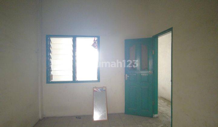 Ruko di Jl. Pepaya Guru Patimpus  9