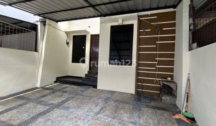 Rumah 2.5 Lantai di Perumahan Taman Cosmos, Kedoya Utara 2