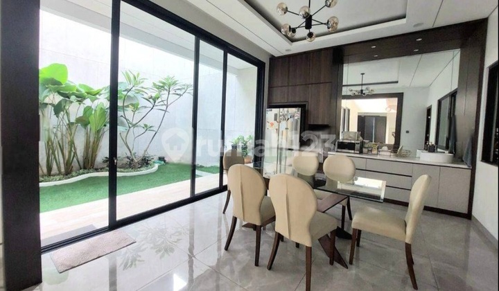 Two-Story Tropical Modern Cluster Home at Sutera Buana