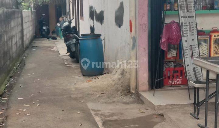 Tanah Murah 300 M2 Pinggir Jalan Raya Kalimulya  1