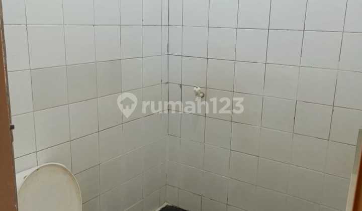 Rumah Taman anyelir dalam perumahan dekat st Depok 2