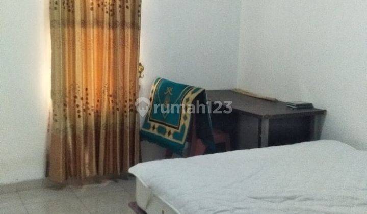 Rumah sewa parkir mobil luas  11
