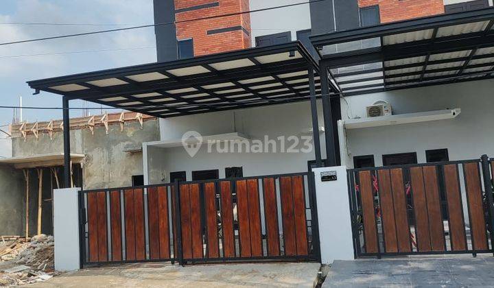 Rumah Dengan Tampilan Industrialis di Kota Medan 1