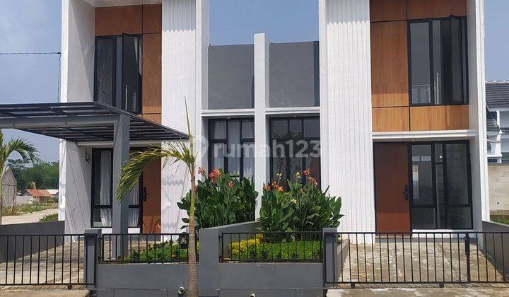 Rumah baru di citeureup dengan pemandangan pegunungan hijau 1