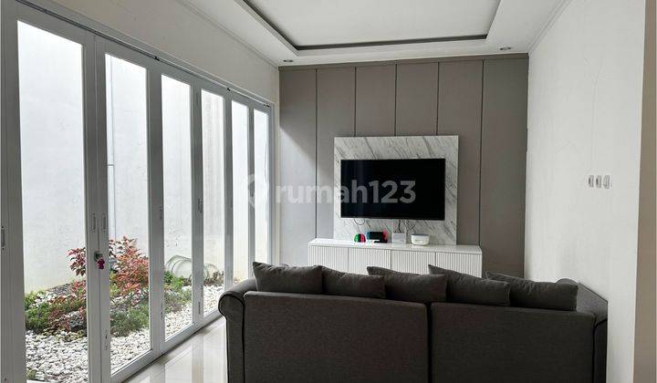 ruang keluarga rumah pesona bali city view