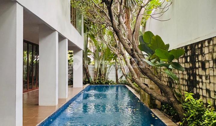For Rent Tropical House Cilandak Gaharu 5BR With Lush Garden And Swimming Pool 2