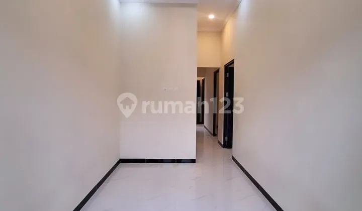 Affordable Red Brick House 3 Bedrooms Ready to Occupy in Cilodong Depok 2