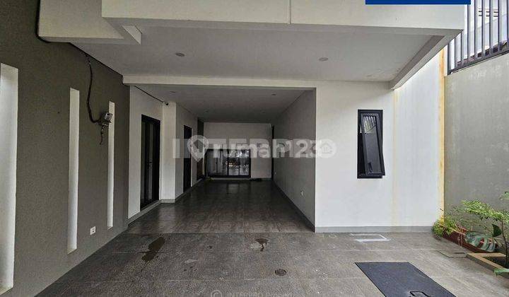 Rumah Industrial Tropis Bangunan Estetik Taman Alfa Indah 126m2 2