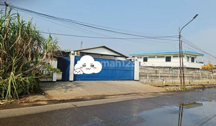 Gudang dikawasan Industri Buana, kota Bumi, Tangerang ,luas tanah =9.550m2, luas bangunan=5.550m2,ada gedung kantor 2lantai,certificate SHM,  parkir luas sekali, aman untuk truck besar/truck fuso 2