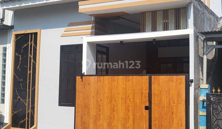 Rumah Minimalis Dengan Teras Belakang  1