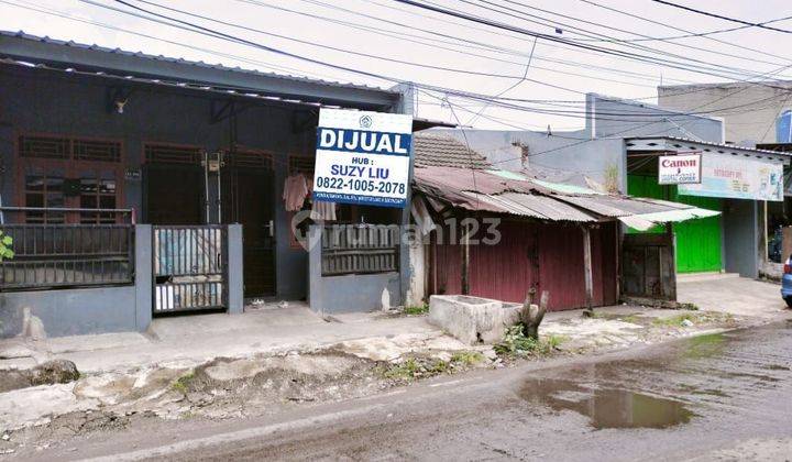 RUMAH KONTRAKAN 2 PINTU TERLETAK DIPINGGIR JALAN RAYA BISA UTK USAHA 1