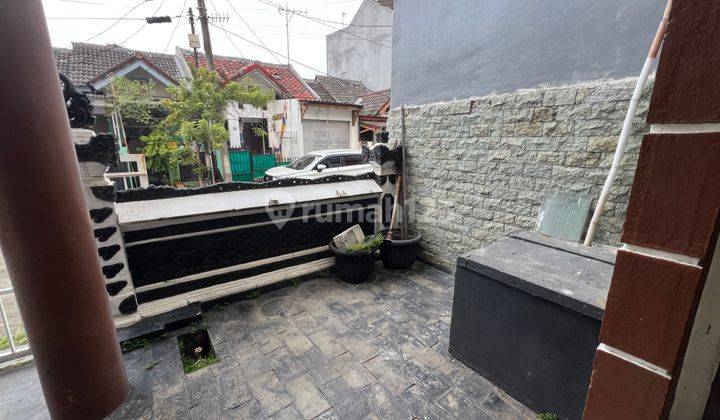 teras rumah 2 lantai siap huni