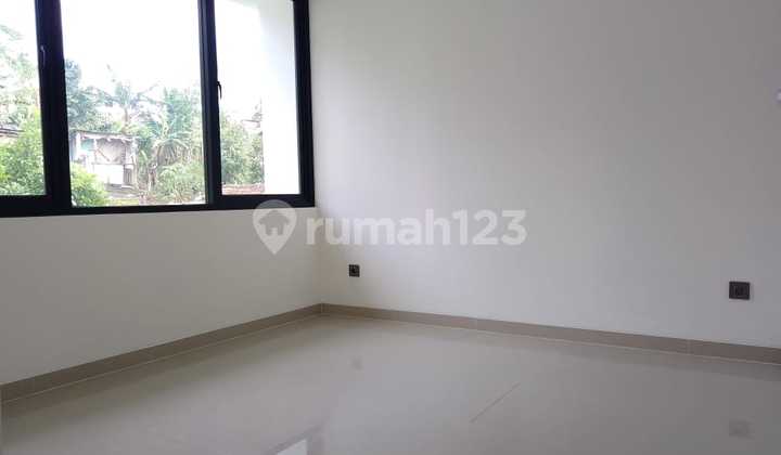 New Minimalist 2-Story House in a Cluster at Pondok Hijau New Minimalist 2-Story House in a Cluster at Pondok Hijau