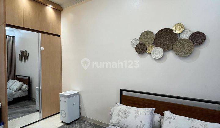 Rumah Bergaya Modern Dan Nyaman di Taman Pulo Indah Penggilingan Jakarta Timur 2