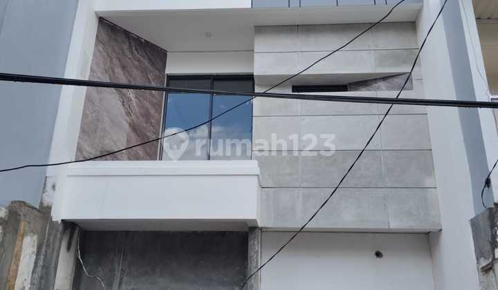 New 3-Story House for Sale in Citra Garden 3, West Jakarta 1