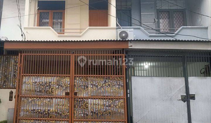 Disewakan Rumah Taman Palem Lestari Blok Bebas Banjir, Jakarta Barat 1