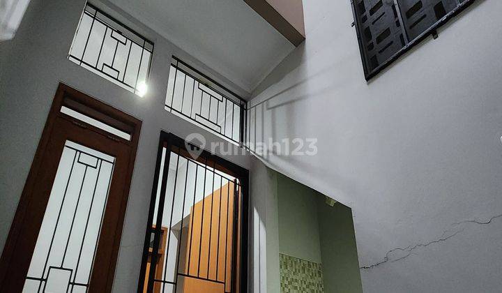 Rumah baru siap huni semi furnished dekat tol univ rs pasar fasilitas lengkap perum terawat(MT) 2