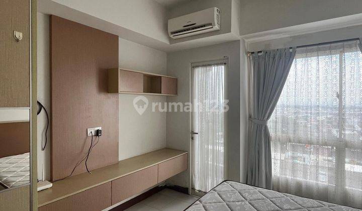 Apartment Scientia Unit Studio yang siap huni, murah dengan furniture sudah lengkap dan selangkah menuju UMN serta area SMS mall.  1