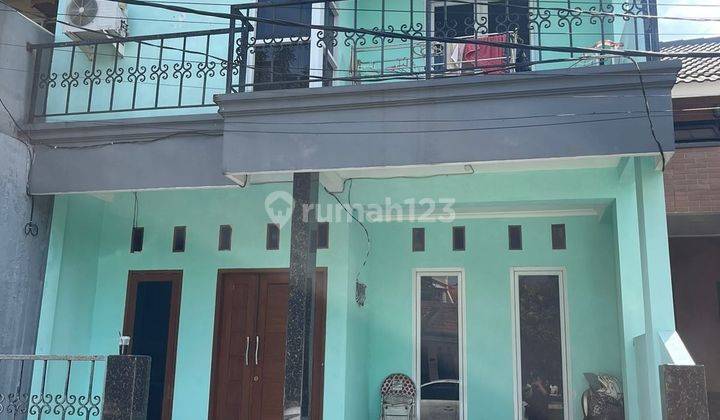 Rumah Siap Huni 2 Lantai Depan Taman Di Graha Raya Sc14039 1