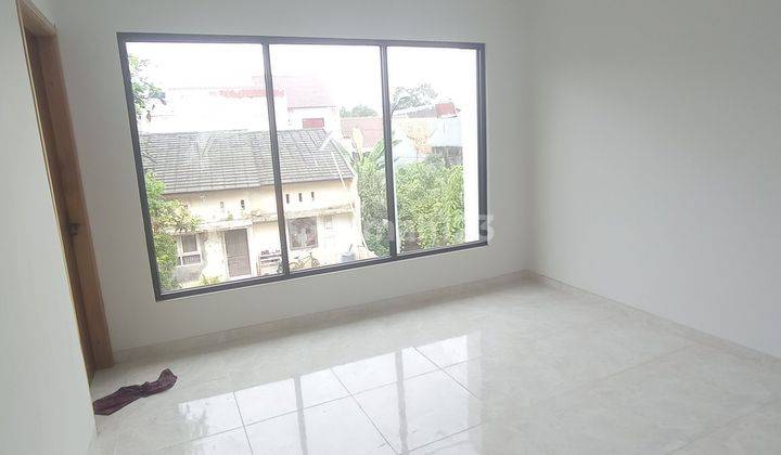 Rumah 2 lantai minimalis modern di jln Ratna Jatikramat  2