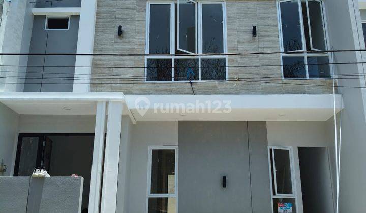 Minimalis Rumah Darmo Permai Selatan Depan Taman 1