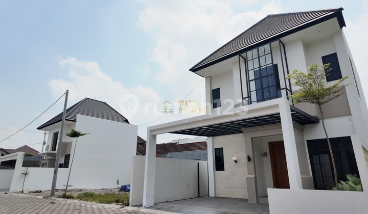 TWO-STORY HOUSE IN A ONE-GATE CLUSTER AT PALAGAN SLEMAN 2