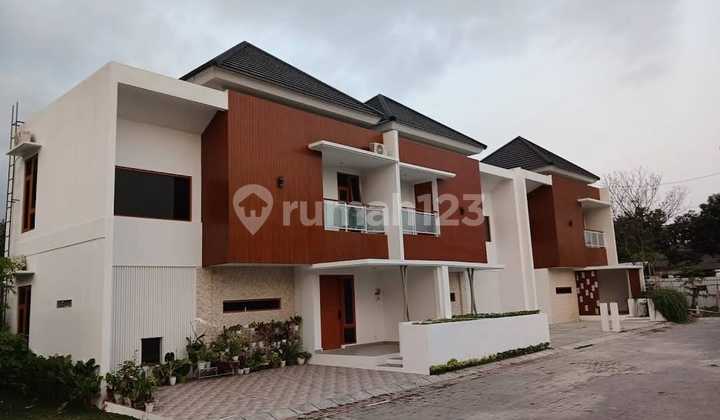 CLUSTER RUMAH 2 LANTAI ONE GATE TERLARIS DI JALAN RAYA TAJEM 2