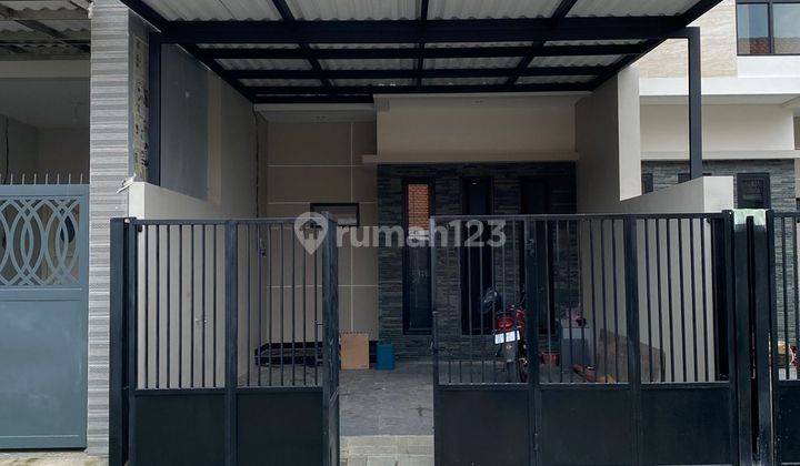 Disewakan Rumah 2 Lantai Manyar Semi Furnished 1