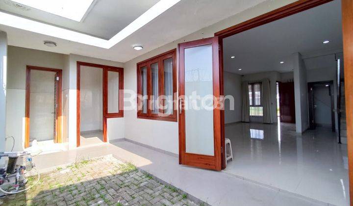 RUMAH MEWAH 2 LANTAI DI PERUMAHAN CLUSTER PREMIUM COLOMADU 1