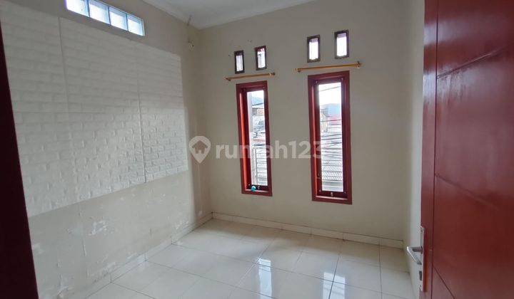 Rumah 2 Lt, Siap Huni, Lingk. Nyaman di Jelutung Raya, Bakti Jaya 9