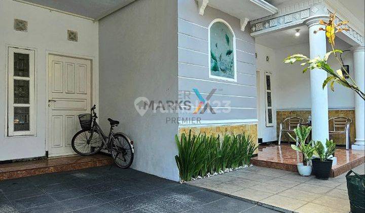 garasi/carport rumah 2 lantai siap huni