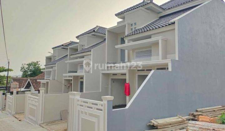 RUMAH 2 LANTAI MODEREN STRATEGIS TENGAH KOTA  3