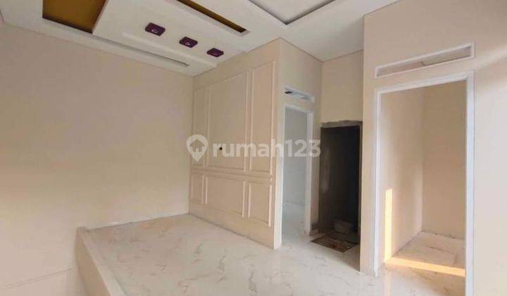 RUMAH 2 LANTAI MODEREN STRATEGIS TENGAH KOTA  10
