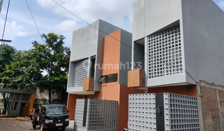 Rumah Modern Industrial Dalam One Gate Cluster 1