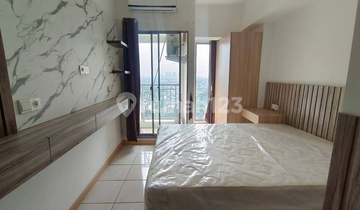 Selling at a loss: Mtown studio furnished opposite mall SMS Gading Serpong