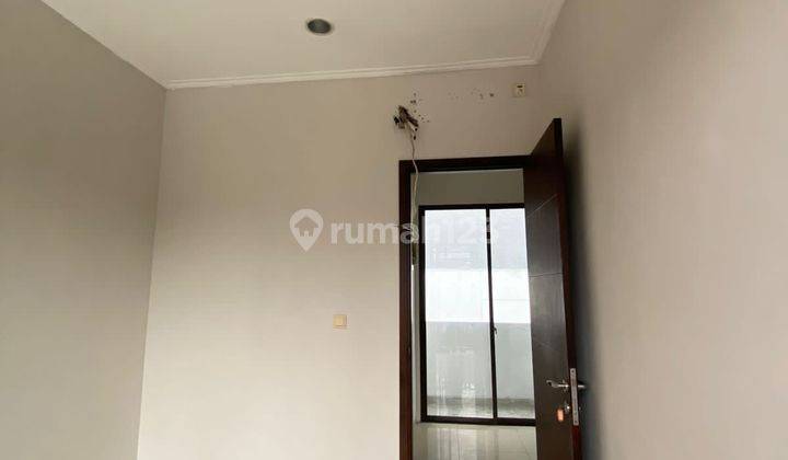 Disewa rumah cluster green lake city dengan harga murah