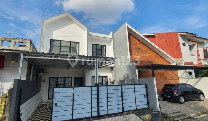 Modern Minimalist Ready-to-Occupy House 2½ Floors Semi-Furnished in Bumi Puspitek Asri