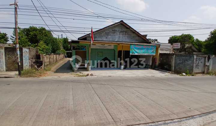 Quick Sale of 627 M² Spacious Land. Bonus with Kiosk Shop, Row House & 1 Main House. Flood-Free in Pondok Cabe, South Tangerang.
