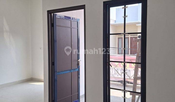 Dijual rumah bangunan baru di Taman Harapan Baru  2