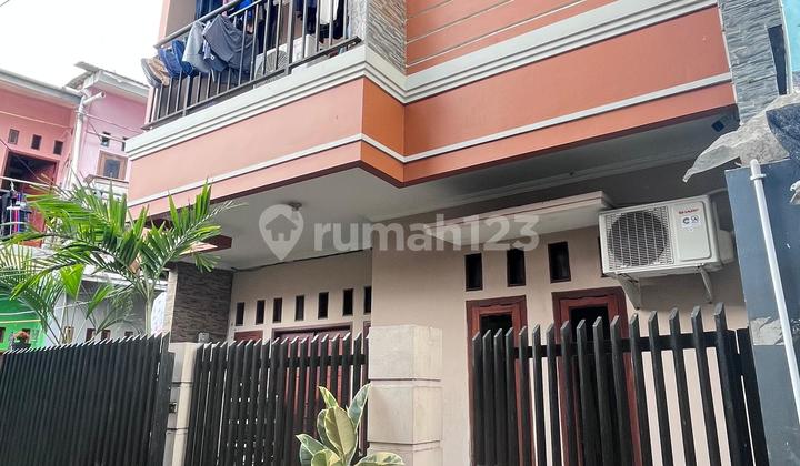 Dijual Rumah Siap Huni 4 Kamar dan Rumah Usaha Jakarta Barat