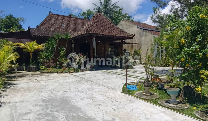 For Sale: Joglo House with Expansive Land and River View in the Cool and Serene Area of Bendosari Pakem. Located at Jakal Km 15.
