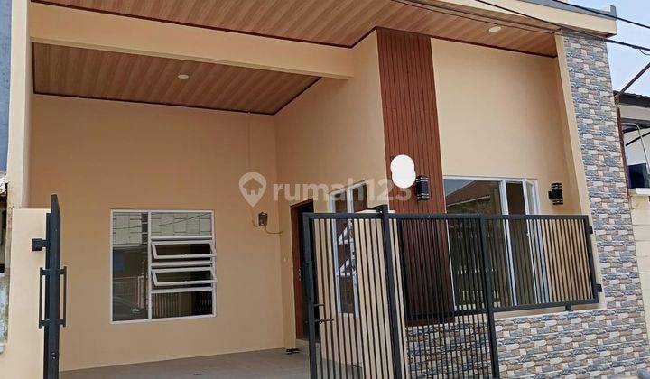 Dijual Rumah Sudah Renovasi Unfurnished SHM di Harapan Indah, Bekasi, 002 1