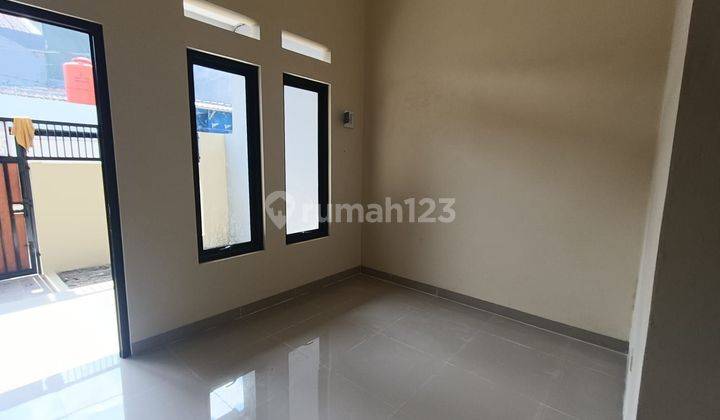 Rumah dekat Mall Grand Cakung Bebas Banjir Dibantu KPR J32211 2