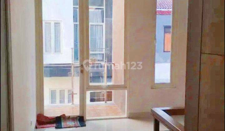 Rumah Seken Terawat SHM Hadap Utara dekat Cibubur Junction Dibantu KPR J21329 2