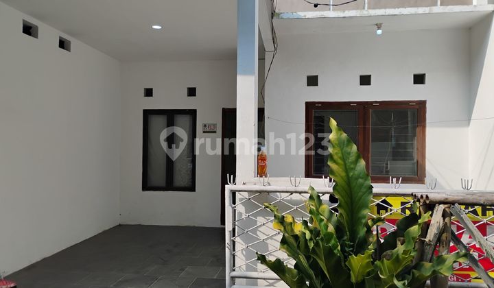 Rumah 10 Menit ke Mall Paradise Walk Serpong Hadap Utara Dibantu KPR J-34135 2