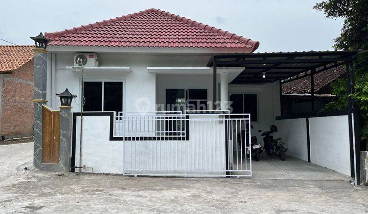 Rumah Baru Full Furniture Dengan Kolam Renang Di Berbah

luas Tanah : 126 M2
luas Bangunan : 60 M2
jumlah Lantai : 1
kamar Tidur : 2
kamar Mandi : 2
full Furniture

ruang Tamu, Ruang Keluarga, Ruang Makan
dapur, Carport, Taman, Kola
- 10 Menit Ke Bandara  1