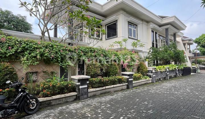 Luxurious 2-Story House with Spacious Land and Swimming Pool in Nandan Griya Idaman Sariharjo Ngaglik Sleman Housing Complex 2