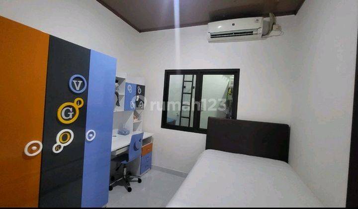 ruang tamu rumah satu lantai siap huni