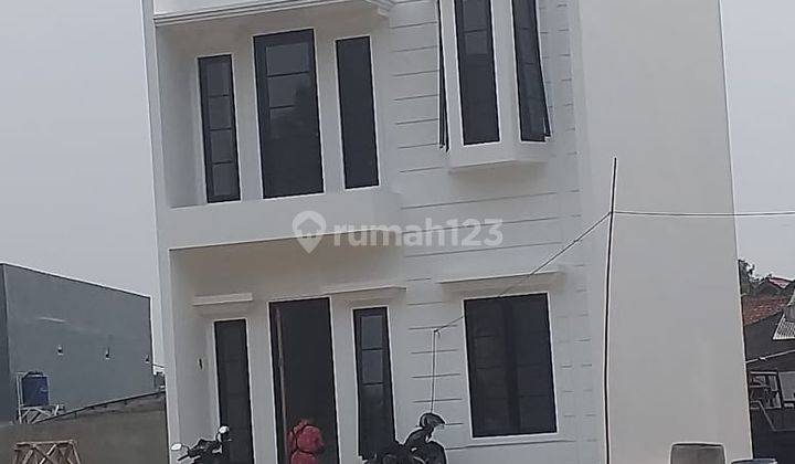 Segera Miliki Rumah Bagus Lokasi Strategis di Pinggir Jalan Raya Munjul Jakarta Timur  1